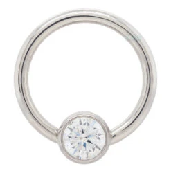Captive Bead Ring (CBR) With Bezel-set Brilliant-Cut Gem - 16 Ga. 3/8" -Starfire – Body Jewelry 40015 AnatometalCaptiveBeadRingwithBezel setBrilliant CutGem 16ga.3.8Single3.16CZ CubicZirconia2