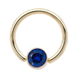 Captive Bead Ring (CBR) In Gold With Bezel-set Synthetic Dark Blue Captive Bead