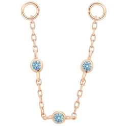 3 Bezel Chain Attachment In Gold With London Blue Topaz -Starfire – Body Jewelry 41602 BuddhaJewelryOrganics3BezelChainAttachmentinGoldwithLondonBlueTopazSingleRoseGoldVENDORPHOTO