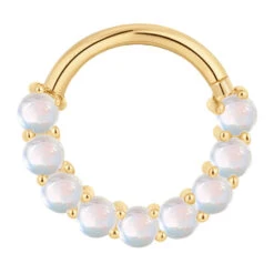 "Revel" Hinge Ring / Clicker In Gold With Rainbow Moonstone -Starfire – Body Jewelry 42148 Buddha Jewelry Organics Revel Hinge Ring Clicker in Gold with Rainbow Moonstone YG VENDOR PHOTO